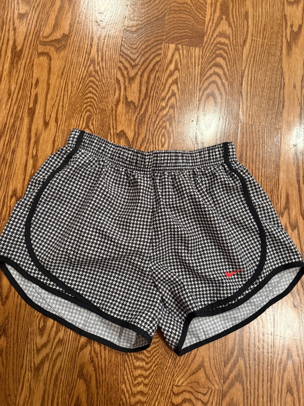 Nike Women’s Black & White Houndstooth Athletic Shorts with Red Swoosh
